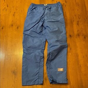 New Balance Light Blue 💯 nylon shell pants.